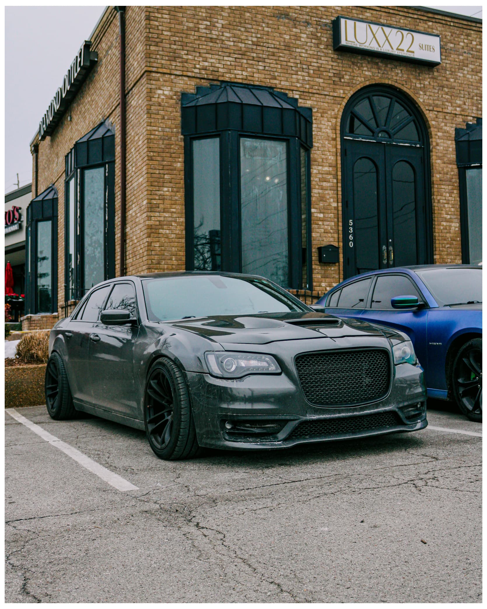 Black Chrysler 300 three-quarter view at Luxx22