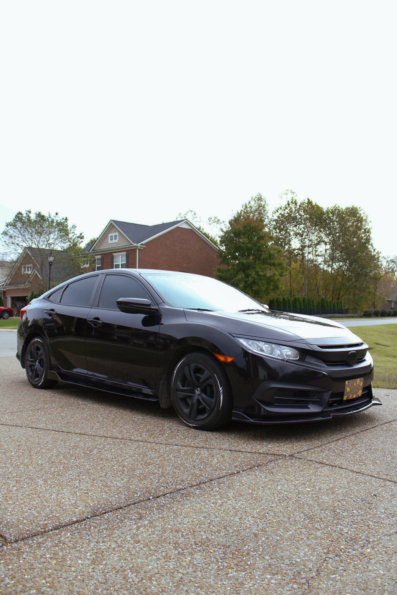 Black Honda Civic sedan side view