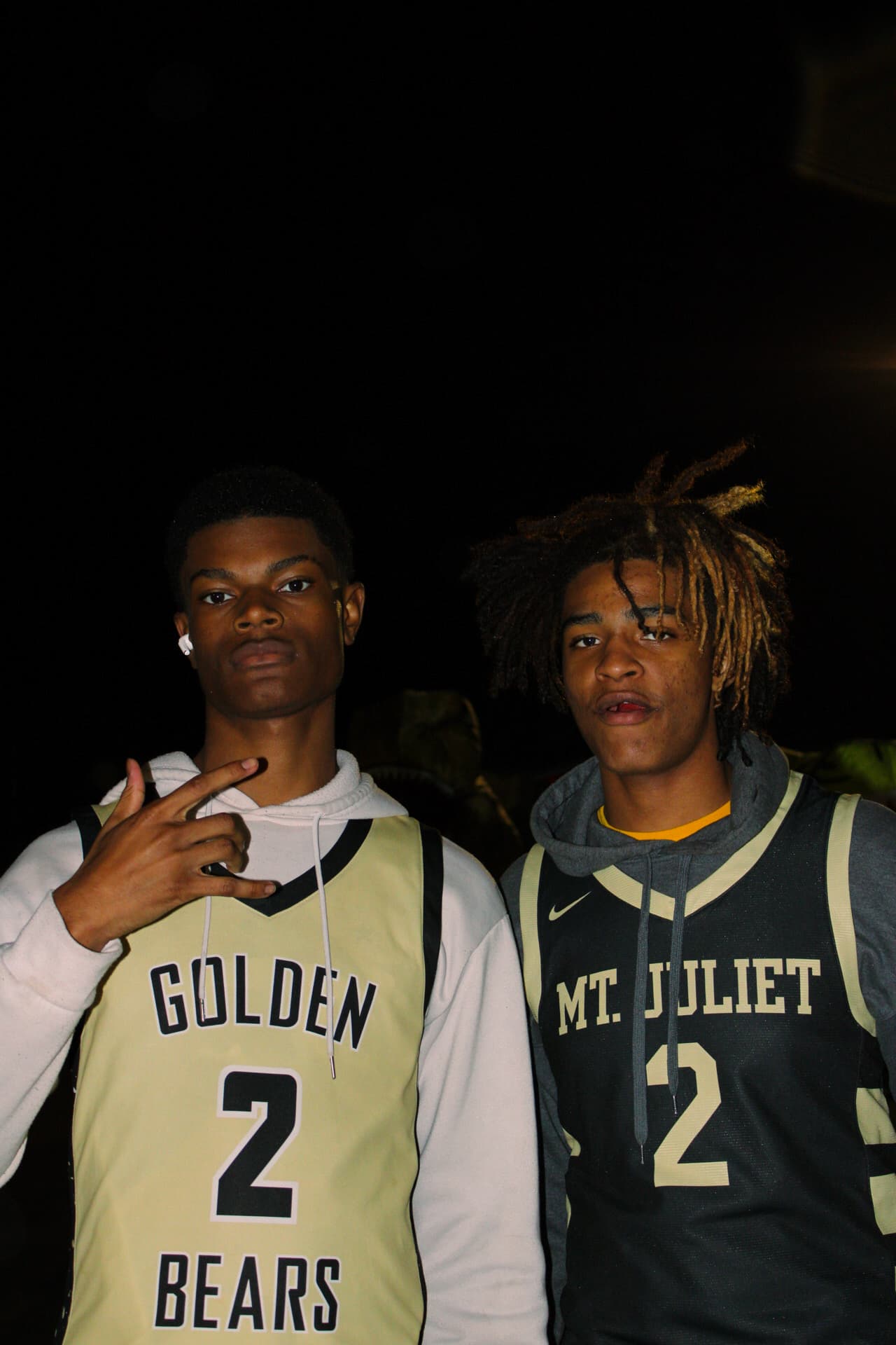 Two athletes in Golden Bears jerseys